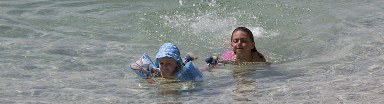 children in the sea