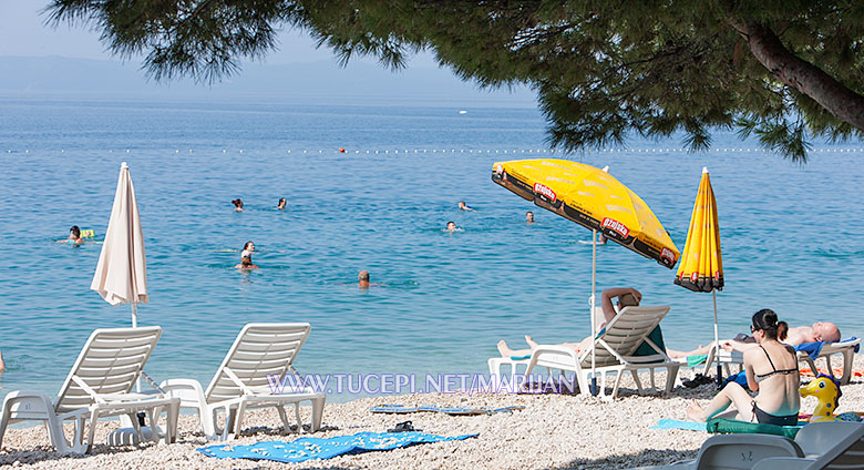 Tučepi beach - sunning on deck chair