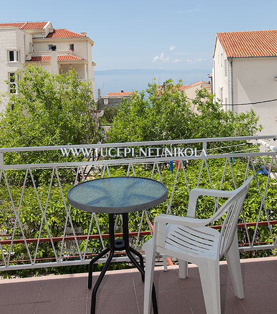 balcony with sea view, apartments Nikola, Tuepi