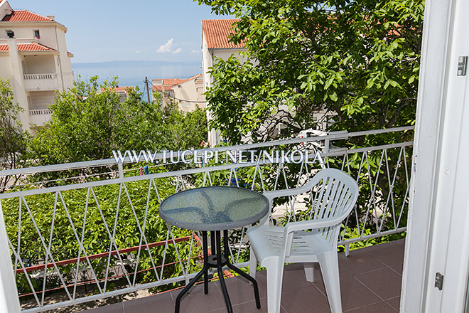 balcony with sea view, apartments Nikola, Tuepi